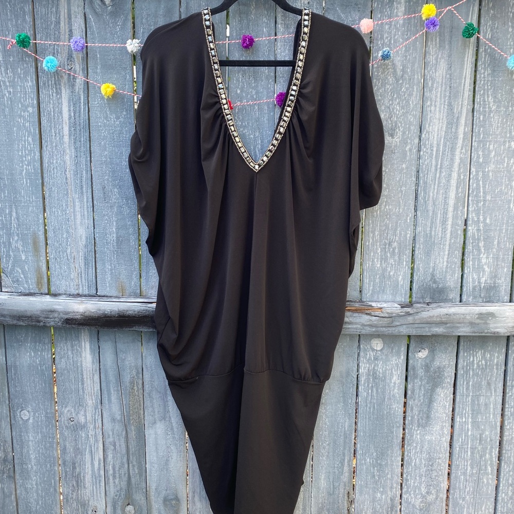 Plunge Neck Embellished Dress

This is in such great condition! Never worn